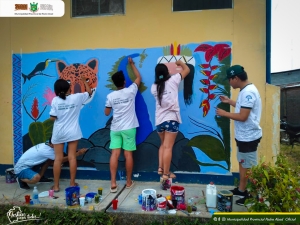 JOVENES SENSIBILIZAN SOBRE EL COVID-19 A TRAVES DE PINTADO DE MURAL EN EL DISTRITO DE BOQUERÓN.